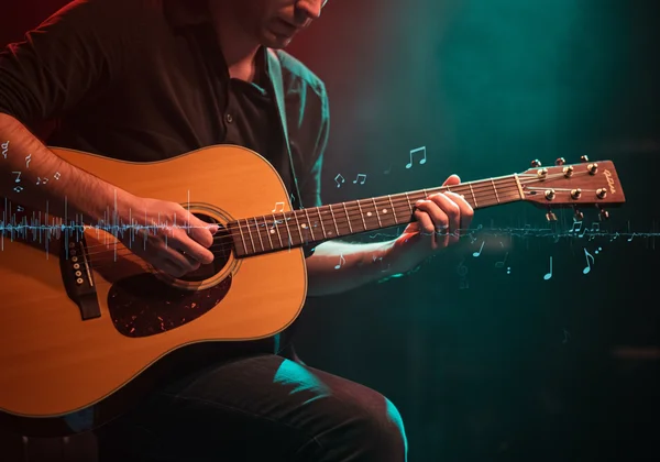 Guitarist exploring unique sounds with alternate tunings
