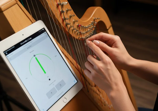 User adjusting instrument using an online tuner